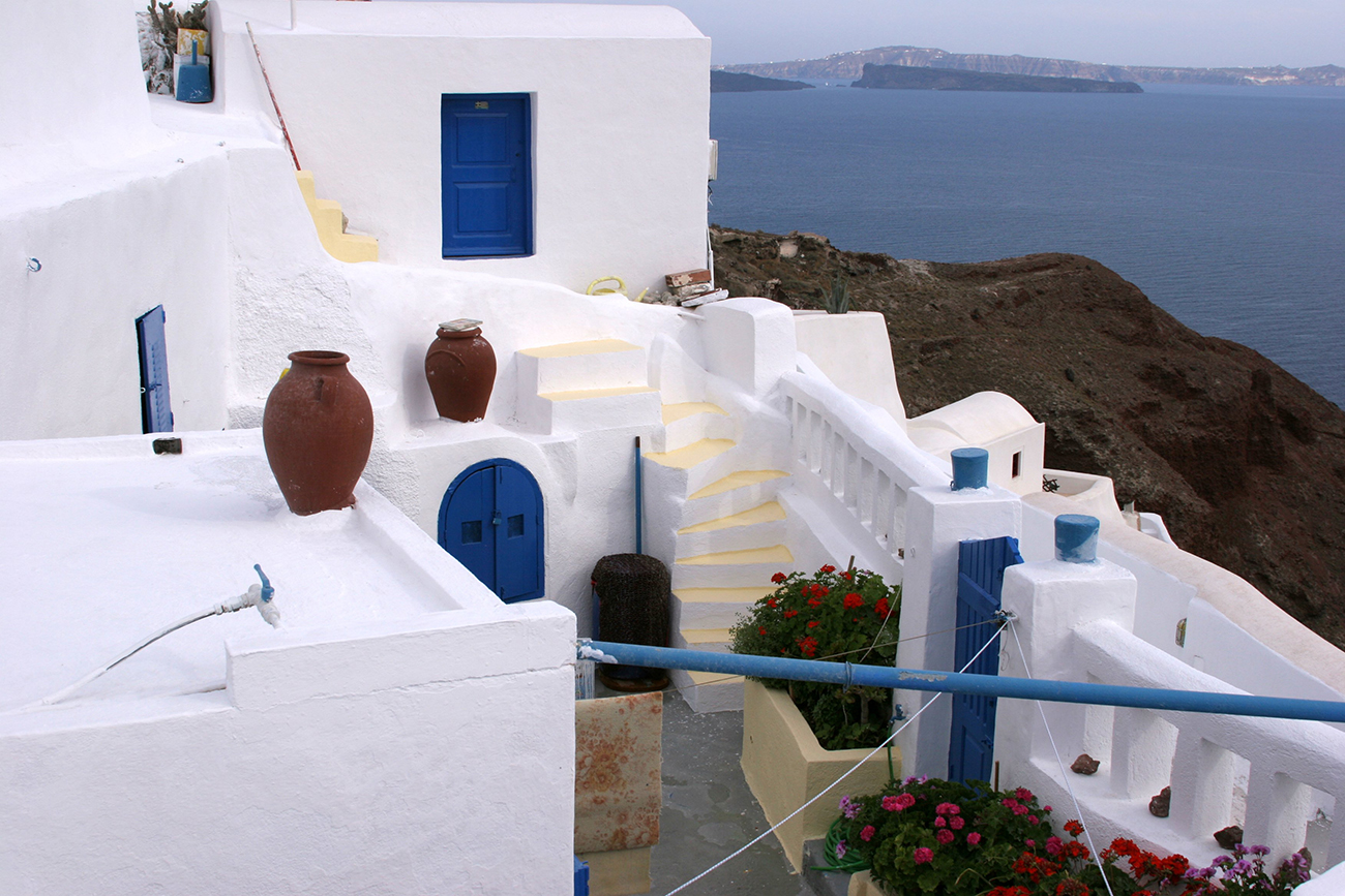 A Greek house and walls rendered and white washed