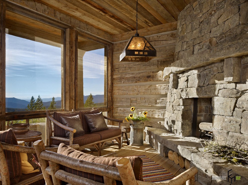 a charming wooden veranda with natural stone firepit idea and unique wooden furnitures plus stripe rug and silver flower pots also antique chandeliers